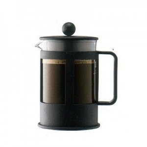 A small cafetiere showing filtered coffee
